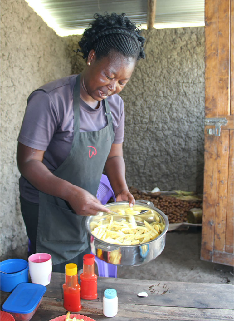 Image of woman in Kenya making chips