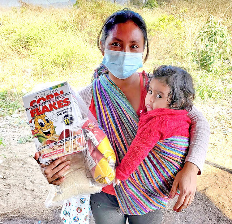 Image of mom and daughter in Guatemala receiving food relief
