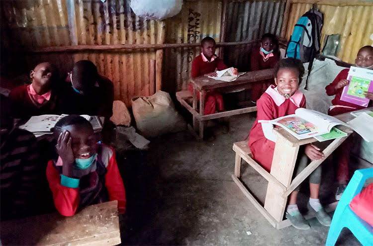 Picture of children in Kenya learning in a classroom