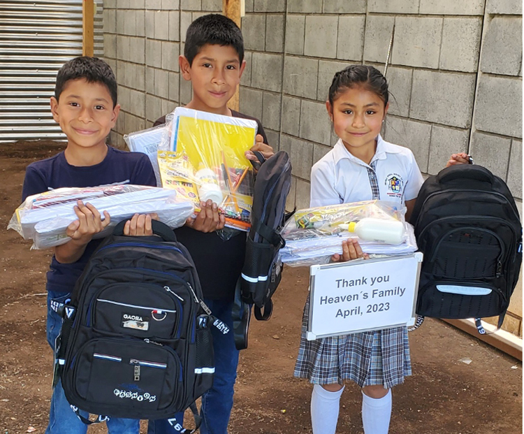 Image of children with school supplies
