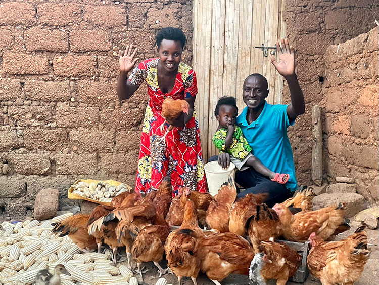 Image of farmer with chicken business