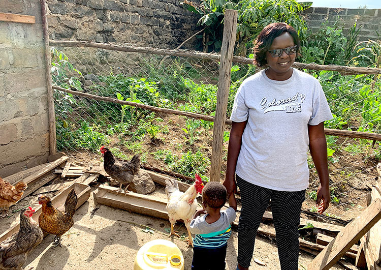 Image of borrower in Kenya with chickens